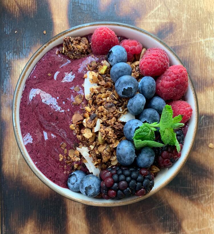 Acai Latte, Acai bowl with berries and granola